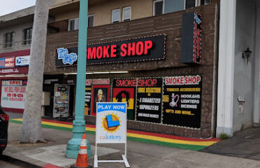 The Cage Smoke Shop